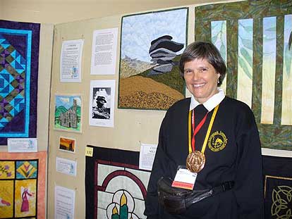 Gwenenen with a quilt from Caradon in Cornwall
